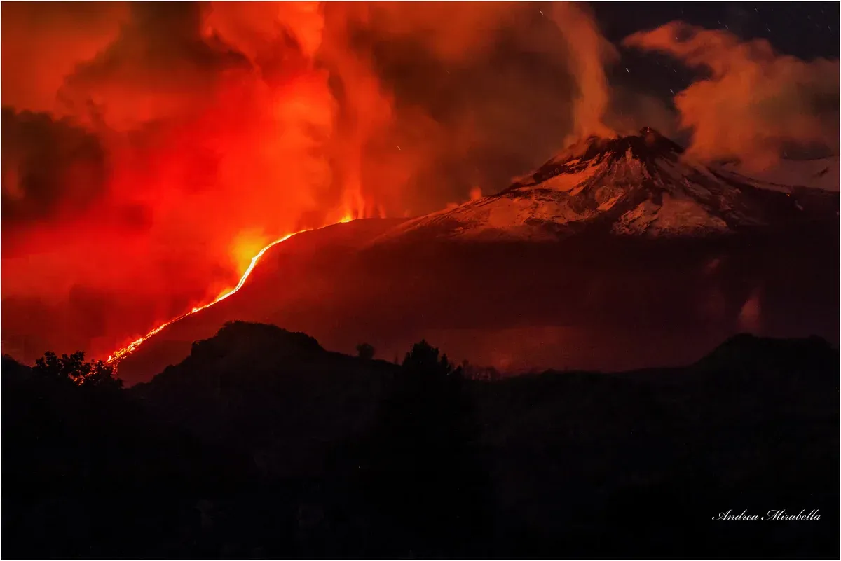 Evening glow over Mount Etna's craters seen on the sunset tour from Catania, Sicily